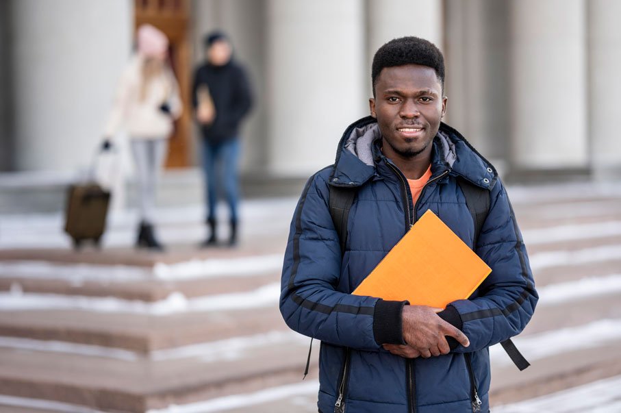 portrait-male-student-with-books-(1)